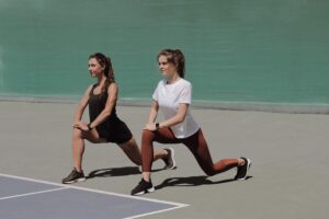 Tennis Players doing Lunges